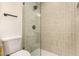 Modern bathroom featuring a walk-in shower with sleek fixtures and neutral tiling at 461 W Holmes Ave # 323, Mesa, AZ 85210