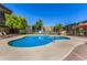Inviting community pool offering residents a refreshing oasis for relaxation and fun in a picturesque setting at 461 W Holmes Ave # 323, Mesa, AZ 85210