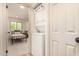 A stacked washer and dryer in laundry area at 461 W Holmes Ave # 323, Mesa, AZ 85210