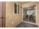 Cozy patio with stylish flooring, leading to a dining area through sliding glass doors at 461 W Holmes Ave # 323, Mesa, AZ 85210