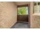 Private patio area with slat-style flooring and wood accents, perfect for relaxing outdoors at 461 W Holmes Ave # 323, Mesa, AZ 85210