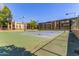 Well-maintained community tennis courts with ample lighting, surrounded by lush greenery, ideal for active residents at 461 W Holmes Ave # 323, Mesa, AZ 85210