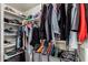 Organized walk-in closet with shelving, hanging rods, and storage baskets for optimal use of space at 4627 W Laurie Ln, Glendale, AZ 85302