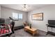 Bedroom featuring a treadmill, ceiling fan, and natural light at 509 S 111Th Dr, Avondale, AZ 85323