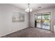 Bright dining area with sliding door to patio for indoor-outdoor living at 509 S 111Th Dr, Avondale, AZ 85323