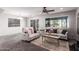 Inviting living room with neutral walls, lots of natural light, and comfortable seating at 509 S 111Th Dr, Avondale, AZ 85323