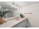 Bathroom vanity with sleek hardware, modern mirror, and decorative accents at 5104 N 32Nd St # 114, Phoenix, AZ 85018