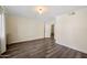 Bright bedroom with neutral walls, recessed lighting, and wood-look flooring at 5104 N 32Nd St # 114, Phoenix, AZ 85018