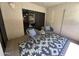 Cozy patio with stylish seating and a patterned rug, perfect for relaxing outdoors at 5104 N 32Nd St # 114, Phoenix, AZ 85018