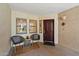 Cozy front porch with comfortable seating and unit number 114 at 5104 N 32Nd St # 114, Phoenix, AZ 85018