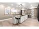 Elegant dining room with a glass table, seating for ten, designer lighting, and artistic decor at 5250 E Deer Valley Dr # 146, Phoenix, AZ 85054