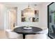 Dining room with modern chandelier, table, and chairs at 5250 E Deer Valley Dr # 146, Phoenix, AZ 85054