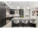 Modern kitchen with stainless steel appliances, granite countertops, and a center island with seating at 5250 E Deer Valley Dr # 146, Phoenix, AZ 85054
