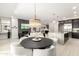 A lovely open-concept living space, featuring modern lighting and upscale finishes at 5250 E Deer Valley Dr # 146, Phoenix, AZ 85054