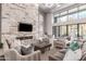 Relaxing lounge area with a marble fireplace, plush seating, and floor to ceiling windows with community views at 5250 E Deer Valley Dr # 146, Phoenix, AZ 85054