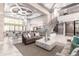 Bright and open lounge featuring high ceilings, stylish furniture, and plenty of natural light throughout at 5250 E Deer Valley Dr # 146, Phoenix, AZ 85054