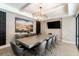 Conference room with a large table, comfortable seating, and a modern chandelier, perfect for meetings and discussions at 5250 E Deer Valley Dr # 146, Phoenix, AZ 85054