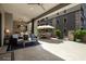 Spacious outdoor patio with a full kitchen, plenty of seating, and shade from the sun, allowing for year-round enjoyment at 5250 E Deer Valley Dr # 146, Phoenix, AZ 85054