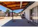 Spacious backyard with a covered patio, gazebo, and ample room for outdoor activities at 5432 W Sunnyside Dr, Glendale, AZ 85304