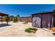 Backyard with a covered patio and gazebo with room for outdoor seating and entertaining at 5432 W Sunnyside Dr, Glendale, AZ 85304