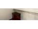 Showing closet with brown dresser on right and closet clothing rack at 5432 W Sunnyside Dr, Glendale, AZ 85304