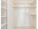 Bright white walk-in closet with shelving and hanging rods for optimal organization at 7910 E Navarro Ave, Mesa, AZ 85209