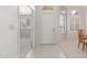Bright entryway with tiled flooring and a view into the living spaces at 7910 E Navarro Ave, Mesa, AZ 85209