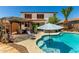 Beautiful backyard with a refreshing pool, covered patio, and desert landscaping providing a private and serene escape at 861 E Indian Wells Pl, Chandler, AZ 85249