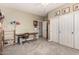 Functional bedroom with a workspace, closet, and neutral decor at 861 E Indian Wells Pl, Chandler, AZ 85249