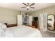 Well-lit bedroom featuring neutral decor, ceiling fan and 2 doorways at 861 E Indian Wells Pl, Chandler, AZ 85249