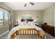 Comfortable bedroom with a large bed, soft lighting, and neutral decor at 861 E Indian Wells Pl, Chandler, AZ 85249