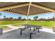 Community gazebo featuring covered seating and picnic table, perfect for gatherings at 861 E Indian Wells Pl, Chandler, AZ 85249