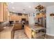 Beautiful kitchen featuring custom cabinets, modern appliances, and an island with bar seating at 861 E Indian Wells Pl, Chandler, AZ 85249