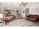 Open-concept living room flows into the kitchen, with neutral tones and comfortable seating at 861 E Indian Wells Pl, Chandler, AZ 85249
