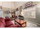 Bright living room with a high ceiling, decorative accents, and large windows at 861 E Indian Wells Pl, Chandler, AZ 85249