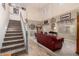 Bright living room featuring a staircase, high ceilings, and decorative accents at 861 E Indian Wells Pl, Chandler, AZ 85249