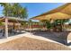 Community playground featuring play equipment, picnic tables, and shade structures offering a fun and safe environment for children at 861 E Indian Wells Pl, Chandler, AZ 85249