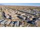 Extensive aerial view of a thriving suburban community with a network of roads and residences at 9835 E Wavelength Ave, Mesa, AZ 85212
