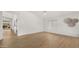 Bright living room with neutral decor, wood-look floors, and backyard view at 10046 E Posada Ave, Mesa, AZ 85212