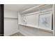 Walk-in closet with bright lighting, organized shelving, and rod at 10046 E Posada Ave, Mesa, AZ 85212