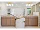 Bathroom featuring a vanity with double sinks, a makeup counter, and a glass shower at 10300 N 48Th Pl, Paradise Valley, AZ 85253