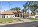 Stunning home with a tile roof, meticulously landscaped front yard, and a grand entrance with palm trees at 10300 N 48Th Pl, Paradise Valley, AZ 85253