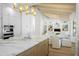 Open-concept kitchen offers marble counters, stainless steel appliances, and an inviting island at 10300 N 48Th Pl, Paradise Valley, AZ 85253