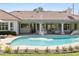 Stunning backyard pool featuring a pristine tile roof and expansive covered patio area at 10300 N 48Th Pl, Paradise Valley, AZ 85253