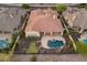 Stunning aerial view of a home with a private backyard oasis, including a pool and a putting green at 12809 W Oyer Ln, Peoria, AZ 85383