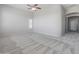 Large, airy bedroom with neutral carpet, ceiling fan, and ample light at 12809 W Oyer Ln, Peoria, AZ 85383