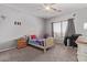 Comfortable bedroom featuring a ceiling fan, window, and cozy single bed setup at 1342 E Jade Dr, Chandler, AZ 85286