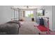 Playroom with wall bars, gymnastics mat, climbing rope, media center, and two oversized beanbag chairs at 1342 E Jade Dr, Chandler, AZ 85286