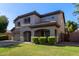 Stunning two-story home featuring well-maintained landscaping and a three car garage at 1342 E Jade Dr, Chandler, AZ 85286