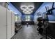 Home gym with weights, mirrors, and sleek black and blue color scheme at 1342 E Jade Dr, Chandler, AZ 85286